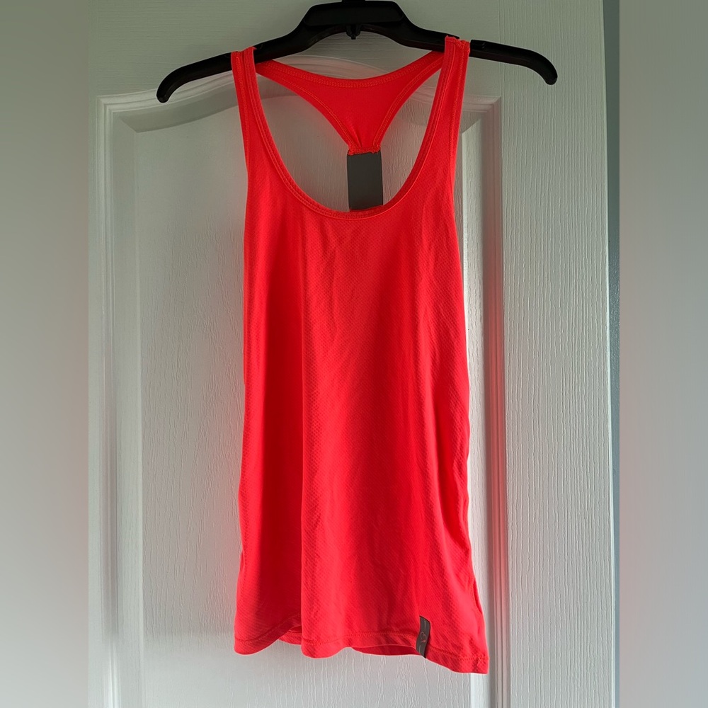 Neon orange colored workout tank top. Size x-small